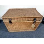 An early 20th century wicker hamper