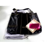 A Jimmy Choo black leather hand bag with dust cover bag (as found) together with a boxed Jimmy Choo