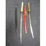 Two Japanese style katanas in scabbards