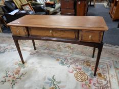 A Stag Minstrel three drawer side table
