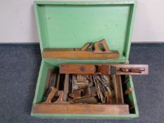 A 20th century painted pine box containing a quantity of vintage woodworking tools to include block