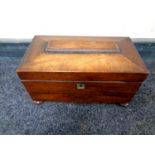 A Regency mahogany tea caddy with fitted interior CONDITION REPORT: Section of