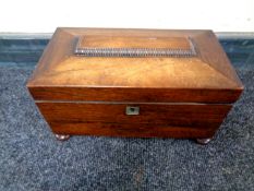 A Regency mahogany tea caddy with fitted interior CONDITION REPORT: Section of