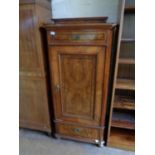 A 19th century mahogany and walnut cabinet fitted two drawers