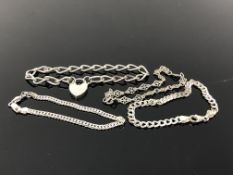 Four silver bracelets