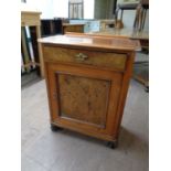 A 19th century pine cabinet fitted a drawer with a walnut panelled drawer