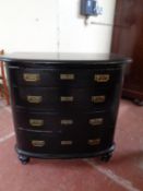 A 19th century painted pine bow fronted four drawer chest