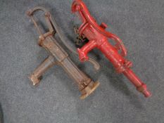 Two cast iron water pumps