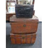 Three antique tin trunks