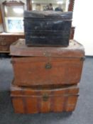 Three antique tin trunks