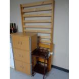A pine effect cabinet together with a 3ft pine bed frame and a two tier telephone table