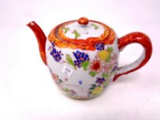 A 20th century Japanese hand painted teapot