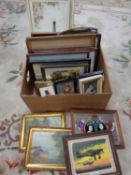 A box containing a large quantity of framed pictures and prints together with four unframed