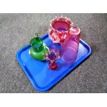 A tray containing four pieces of antique glassware to include a hand painted green glass jug,