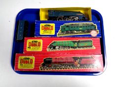 A tray containing Hornby Dublo 3232 diesel locomotive, 2211 locomotive and tender,