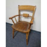 A beechwood kitchen armchair