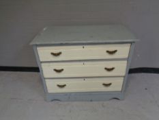 An Edwardian painted three drawer chest