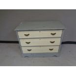 An Edwardian painted three drawer chest