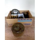A box containing assorted metal wares to include two Riley hub caps, brass door handles,