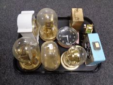 A tray of 20th century mantel clocks to include anniversary clocks under domes,