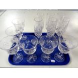 A tray containing a set of six lead crystal wine glasses together with a further set of six