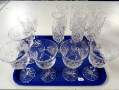 A tray containing a set of six lead crystal wine glasses together with a further set of six