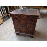 An eastern hardwood eight drawer chest