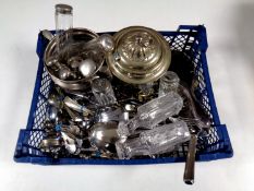 A basket containing a quantity of plated cutlery, tea ware,