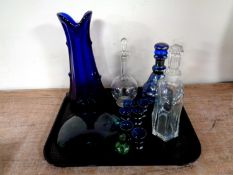 A tray of antique and later glass ware to include liqueur decanters with glasses, blue glass vase,