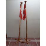 Two Danish flags on pine poles