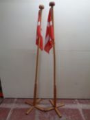 Two Danish flags on pine poles