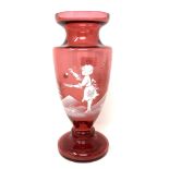 A Mary Gregory style ruby glass vase,