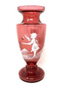A Mary Gregory style ruby glass vase,