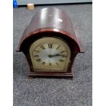 An Edwardian bracket clock with silver dial (electric)