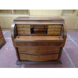 An antique mahogany barrel fronted bureau (as found)