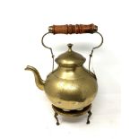 A brass kettle and trivet (2)