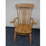 A pine farmhouse armchair