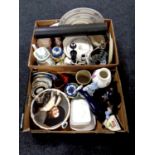 Two boxes containing miscellaneous china to include wall plates, teapots,