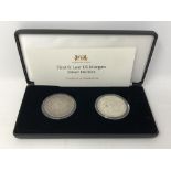 Two American silver dollars, The First and Last US Morgan Silver Dollars, boxed with certificate.