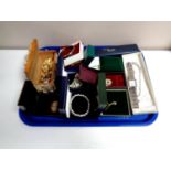 A tray containing a quantity of costume jewellery to include cameo brooch, bracelets,