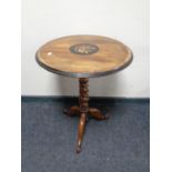 A 19th century inlaid mahogany occasional table on barley twist column support