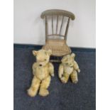 An antique bergere seated child's chair together with two mohair teddy bears