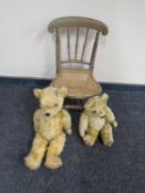 An antique bergere seated child's chair together with two mohair teddy bears