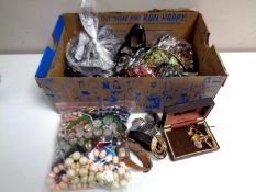 A box containing a large quantity of costume jewellery, lady's and gent's wristwatches,