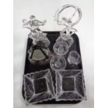 A tray containing assorted glassware to include Art Deco figure, glass handbag,