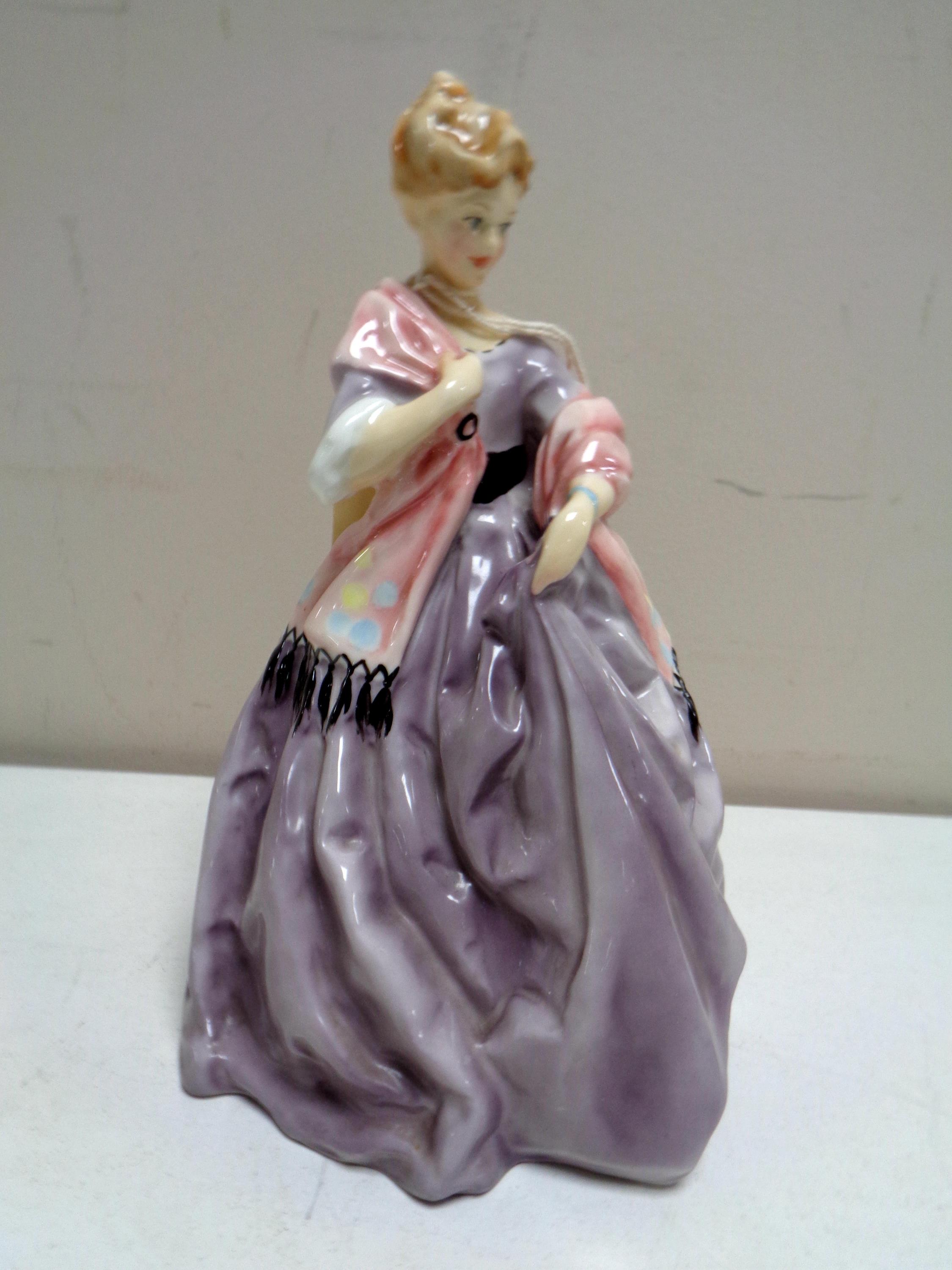 A Royal Worcester figure, First Dance, modelled by F C Doughty, No.