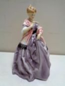 A Royal Worcester figure, First Dance, modelled by F C Doughty, No.