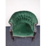 A 19th century tub chair upholstered in a green button dralon