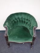 A 19th century tub chair upholstered in a green button dralon