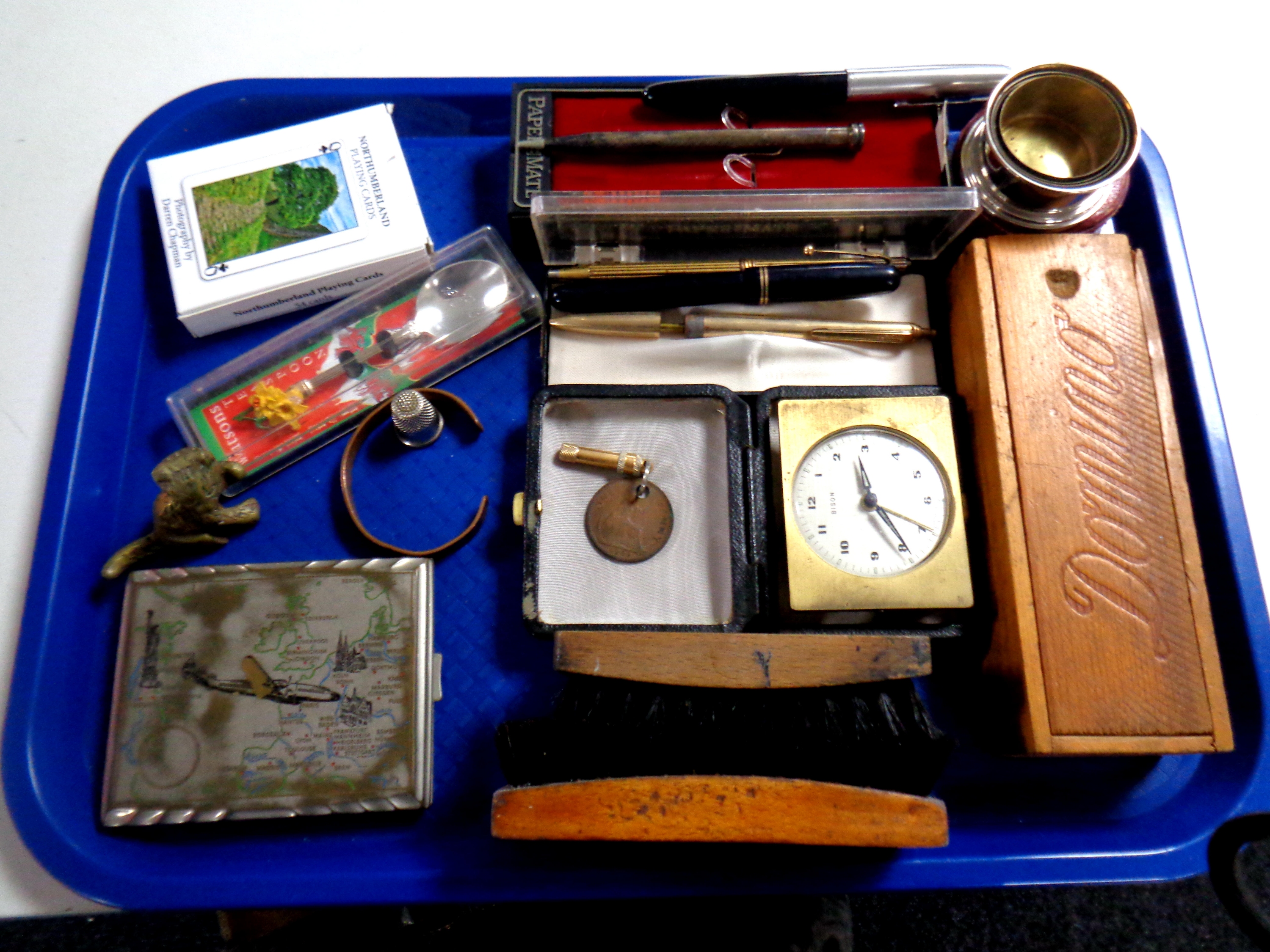 A tray containing miscellaneous to include stirrup cup in case, silver mechanical pencil,